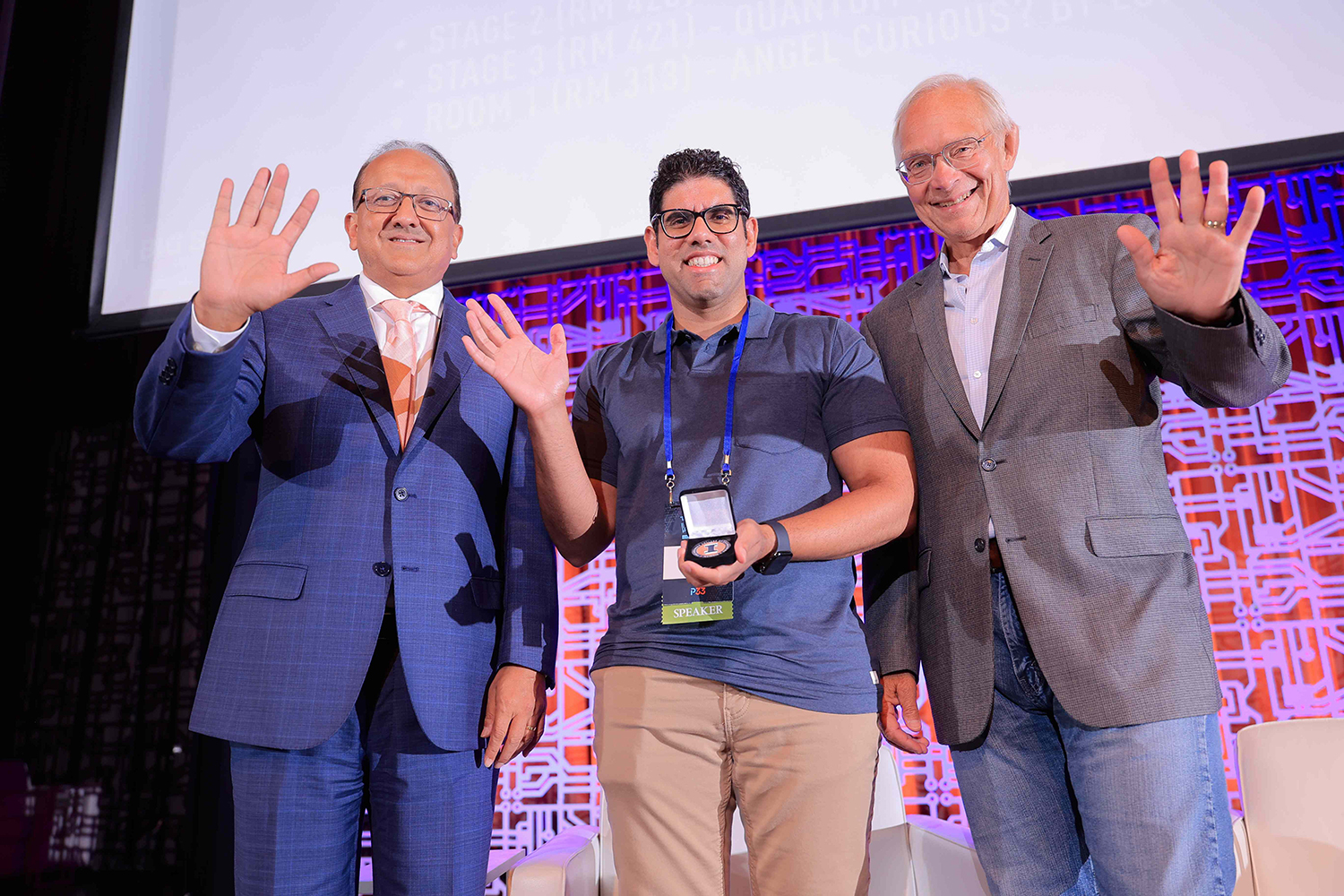 Photo Credit: <em>Sean Su<br></em><br>(L-R): Grainger Engineering Dean Rashid Bashir with Divey Gulati and John Thode, Richard and Gayle Landuyt Professor of Innovation and Entrepreneurship.