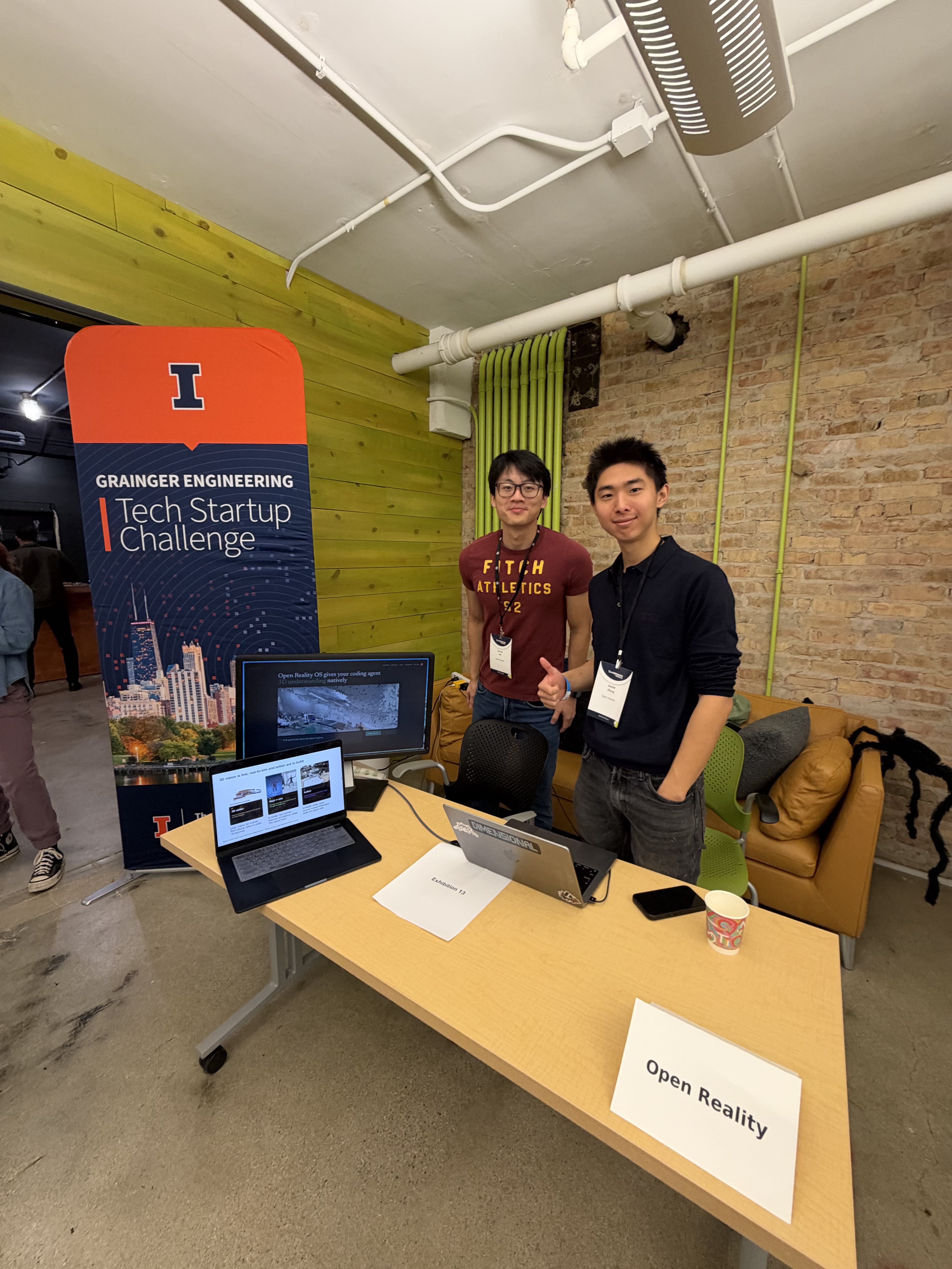 Two students showcasing their startup idea at the startup showcase event. 
